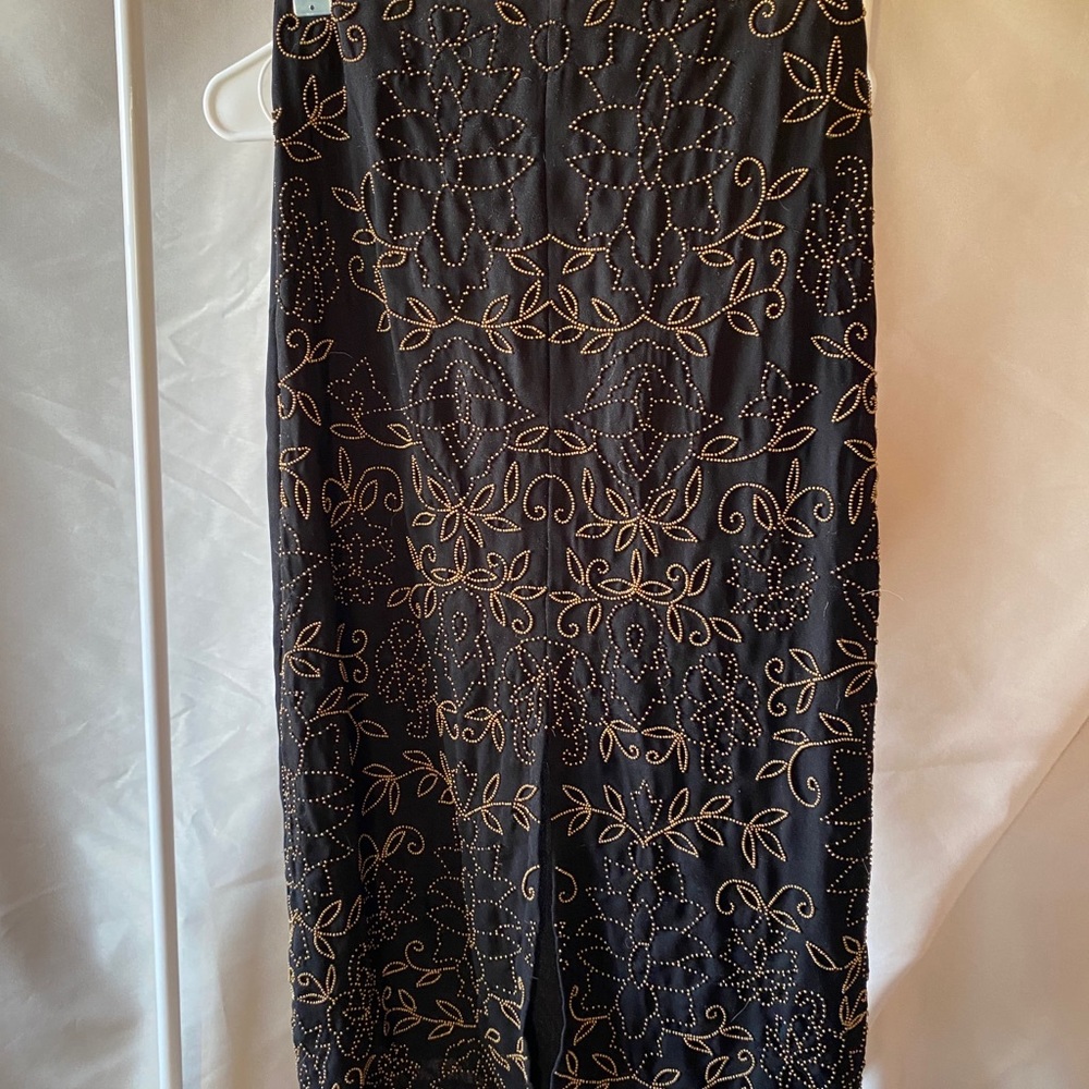 Black and gold beaded skirt.